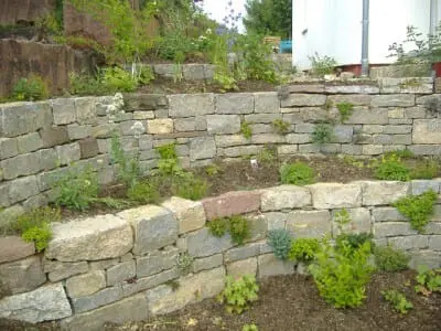 Garten Steinarbeiten Würzburg: Terrassierung aus Naturstein, Ralf Kretzer